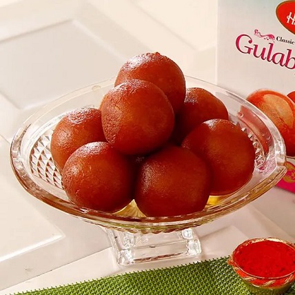 Assorted Sweets With Earthen Diyas