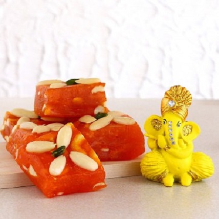 Yellow Ganesha Idol And Karachi Halwa