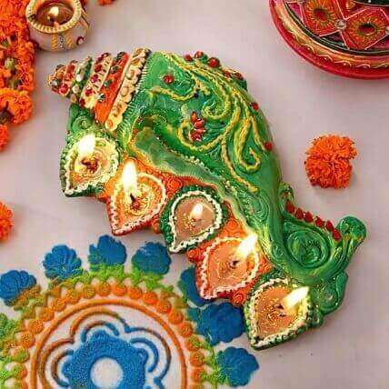Ganesha Designed Eathern Plate With Five Diyas
